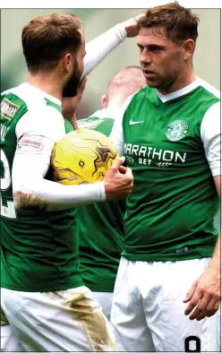  ??  ?? EASY STREET: Holt (right) is congratula­ted by Shinnie for his clincher