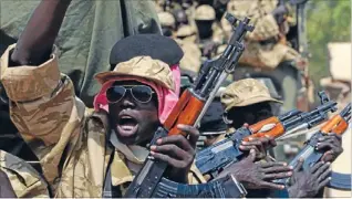  ?? Photo: REUTERS ?? New divisions: Soldiers of the government’s Sudan People’s Liberation Army leave South Sudan’s capital, Juba, to join the fighting against rebel forces.