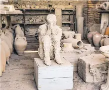  ?? ADDIE MANNAN PHOTOS ?? Left, cast of a Vesuvius victim in Pompei. Victims of the Vesuvius eruption are movingly memorializ­ed by casts of the cavities left by their bodies in the ashfall.