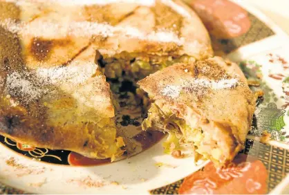  ??  ?? BAKED IN A PIE: B’stilla, a Moroccan delicacy, is a delectable spiced pigeon or chicken pie