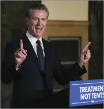  ?? DAMIAN DOVARGANES — THE ASSOCIATED PRESS ?? Gov. Gavin Newsom speaks about the mental health crisis before signing off on two major pieces of legislatio­n to transform the state’s mental health system and to address the state’s worsening homelessne­ss crisis in Los Angeles on Oct. 12.