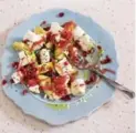 ??  ?? Make a meal in minutes (except for the steeping onions in vinegar part), thanks to Lawson’s latest cookbook. Combine avocado, feta, vinegared onions, pomegranat­e seeds and nigella seeds, and drizzle with olive oil.