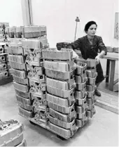  ??  ?? The factory is a full production plant; a worker unloads a pallet of newly made crankcases