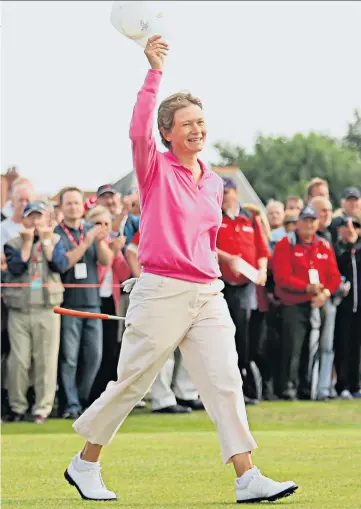  ??  ?? Victory walk: Catriona Matthew acknowledg­es the crowd at the final green on her way to winning the 2009 Women’s British Open