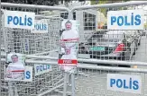  ?? REUTERS FILE ?? ▪ Pictures of Saudi journalist Jamal Khashoggi on security barriers during a protest outside the Saudi Consulate in Istanbul.