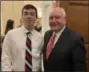  ?? SUBMITTED PHOTO ?? Pennridge High School student Justin Lyons, left, stands with U.S. Secretary of Agricultur­e Sonny Perdue at a reception prior to President Donald Trump’s Feb. 5 State of the Union speech.