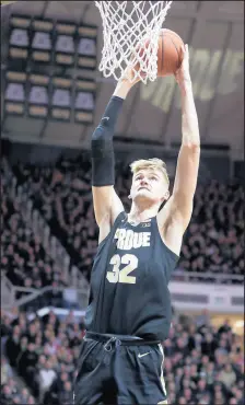  ?? MICHAEL CONROY/AP ?? Purdue’s Matt Haarms finishes off a scoring play against Indiana during the second half Saturday.