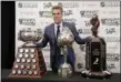  ?? JOHN LOCHER — ASSOCIATED PRESS ?? Connor McDavid of the Edmonton Oilers poses with the Art Ross Trophy, left, the Hart Memorial Trophy, center, and the Ted Lindsay Award.