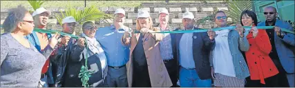  ?? Picture: SIBONGILE NGALWA ?? CLEANLINES­S IS KEY: Buffalo City Metro portfolio head for municipal services Helen Neale May cuts a ribbon to mark the launch of the Call2Actio­n campaign at the Heroes Park in Quiqney yesterday morning. She is flanked by Border-Kei Chamber of Business...