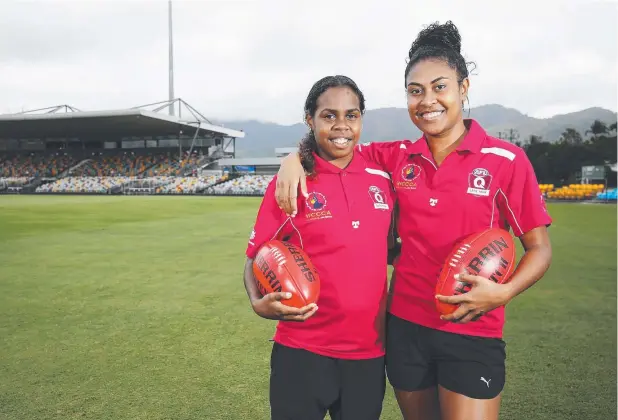  ?? Picture: BRENDAN RADKE ?? ROLE MODELS: Judhil Canendo and Sodyla Kris work for the AFL Cape York House program.