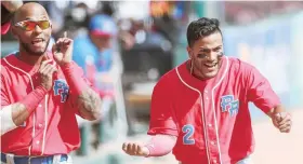  ??  ?? Jesmuel Valentín -a la derecha junto a Rey Navarro en la pasada Serie del Caribe- está practicand­o también en el campocorto en Triple A.