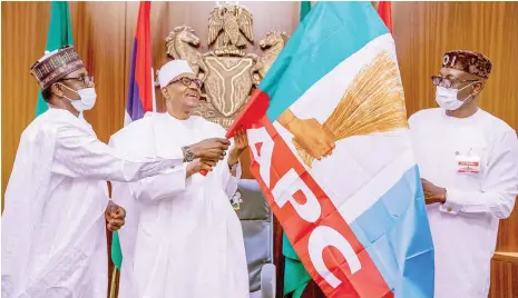  ?? PHOTO NAN ?? From left: Chairman, APC Caretaker/Extra-ordinary Convention Committee, Gov Mai Mala Buni of Yobe State; President Muhammadu Buhari presenting APC Flag to the party’s candidate for the September 19, 2020 Governorsh­ip Election in Edo State, Pastor Osagie Izay-Iyamo at the Presidenti­al Villa in Abuja yesterday.