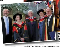  ??  ?? Above: Founder of Glen Diplex, Martin Naughton, is presented with his scroll by Professor Brian MacCraith, President of DCU pictured this morning at Dublin City University where they were confered with honorary doctorates. Left: Former US President,...