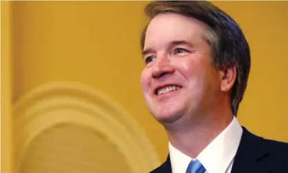  ??  ?? Ads feature photos of a snarling Brett Kavanaugh. Photograph: Leah Millis/Reuters