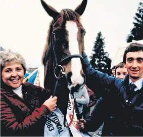  ??  ?? Corbiere with trainer Jenny Pitman and jockey Ben de Haan, celebratin­g after winning the Grand National in 1983.