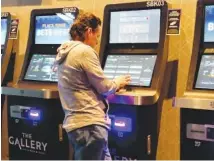  ?? AP PHOTO/WAYNE PARRY ?? A man checks the odds on a sports betting terminal Feb. 6 at the Ocean Casino Resort in Atlantic City, N.J.