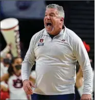  ?? (AP/Brynn Anderson) ?? Auburn Coach Bruce Pearl reacts during the second round of a NCAA Tournament game against Miami in Greenville, S.C., in March. The Tigers are just one of many basketball programs taking advantage of the NCAA transfer portal and adjusting to the sport’s shifting landscape.