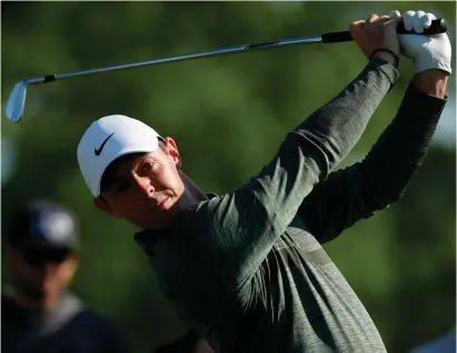  ?? GETTY ?? Rory McIlroy plays a shot during yesterday’s Pro-Am ahead of the Wells Fargo Championsh­ip at Quail Hollow