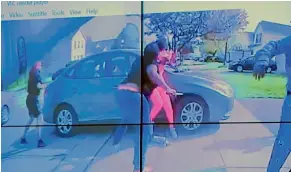  ??  ?? In an image from police bodycam video that the Columbus Police Department played during a news conference, a teenage girl, foreground, appears to wield a knife during an altercatio­n before being shot by a police officer in Columbus, Ohio.