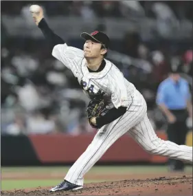  ?? AP PHOTO/WILFREDO LEE ?? Japan’s Yoshinobu Yamamoto delivers a pitch during the fifth inning of a World Baseball Classic game against Mexico on March 20 in Miami.