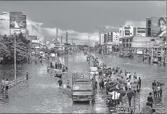  ?? REUTERS ?? A flooded street in Chennai. The Smart City Mission can streamline decisionma­king to ensure better coordinati­on between department­s to tackle urban challenges
