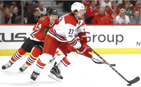  ?? GETTY IMAGES ?? The Hawks could trade for Hurricanes All- Star defenseman Justin Faulk, who would be an ideal fit alongside Duncan Keith on the top pairing and top power- play unit.