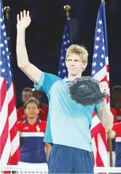  ??  ?? Kevin Anderson of South Africa poses with the finalist trophy during the trophy ceremony after their Men’s Singles Finals match on Day Fourteen of the 2017 US Open at the USTA Billie Jean King National Tennis Center on September 10, 2017 in the...