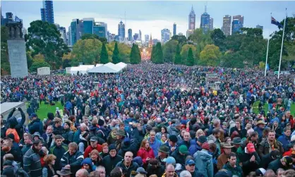  ??  ?? The crowd at an Anzac Day service in Melbourne on 25 April 2015. Photograph: Scott Barbour/Getty Images