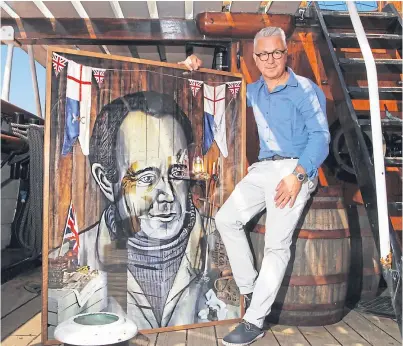  ?? Picture: Mhairi Edwards. ?? Artist Calum Colvin on RRS Discovery with his portrait of Captain Scott.