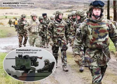  ?? ?? MANOEUVRES Troops training in Co Wicklow for mission
FORMIDABLE Gunner on Mowag armoured car