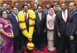  ?? BERNAMAPIX ?? ... Former MIC president Tun S. Samy Vellu (centre) is flanked by the party's vice-president Datuk Mohan Thangarasu and Umno Sungai Petani division deputy chief Datuk Shahanim Mohamad Yusoff after the two were sworn in as senators yesterday. Also...