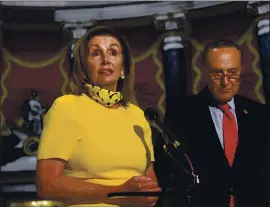  ?? SUSAN WALSH — THE ASSOCIATED PRESS ?? House Speaker Nancy Pelosi speaks as she stands next to Senate Minority Leader Sen. Chuck Schumer in Washington on Monday.