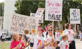  ??  ?? Children protest over schools being forced to close early. ‘Austerity has meant the destructio­n of children’s services, the impoverish­ment of schools …’ Photograph: Penelope Barritt/ Rex/Shuttersto­ck