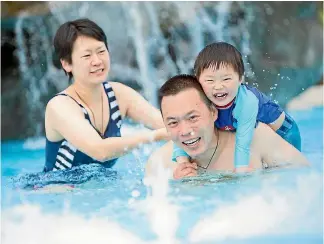  ?? PHOTOS: FAIRFAX NZ, SUPPLIED ?? Clockwise from main: Enjoying the hot pools at Hanmer Springs; nature up close at the Picton marina; a Mandarin-speaking airport ambassador helps people arriving for Chinese New Year.