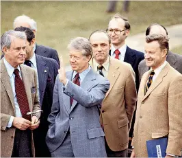  ??  ?? Brzezinski, right, with Carter and, far left, Cyrus Vance, the Secretary of State with whom he clashed