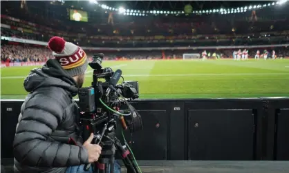  ?? Photograph: Jed Leicester/BPI/ Shuttersto­ck ?? An Amazon Prime camera covers Arsenal v Brighton in 2019, before lockdown ravaged clubs’ finances.