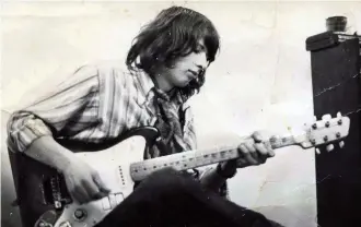  ??  ?? Guitarist reader Rick Biddulph in the 70s with his beloved Grazioso Resonet Futurama, long since sold