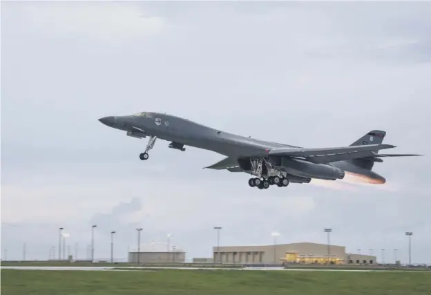  ??  ?? 0 A US Air Force B-1B takes off from Guam for missions with South Korean and Japanese forces over the Korean peninsula