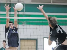  ?? Katharine Lotze/The Signal (See additional photos at signalscv.com) ?? (Left) Saugus’ Stephen Jones (11) goes for a kill over Canyon during a volleyball game at Canyon on Thursday. (Right) Saugus’ Gage Smith (29) blocks a hit from Canyon’s Dustin Deisbeck (5) during a volleyball game at Canyon on Thursday.