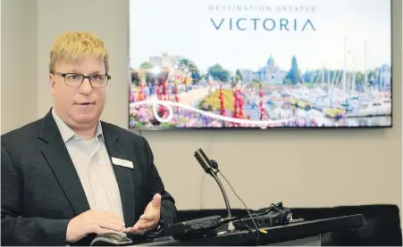  ??  ?? Destinatio­n Greater Victoria CEO Paul Nursey unveils the marketing group’s new name.
