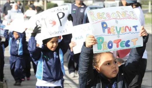  ?? PICTURE: TRACEY ADAMS/AFRICAN NEWS AGENCY (ANA) ?? Children at Happy Valley Daycare in Strandfont­ein during an Internatio­nal Children’s Day awareness walk yesterday, waved placards with messages on the plight of abused and neglected children. At the activity-filled event, they were also educated by the...