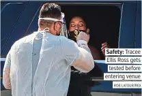  ?? ROB LATOUR/REX ?? Safety: Tracee Ellis Ross gets tested before entering venue