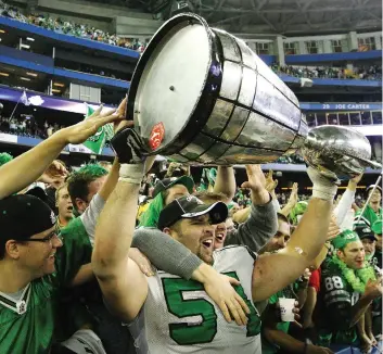  ?? PETER THOMPSON FILES ?? Jeremy O’Day hoisted the Grey Cup in Toronto in 2007 when he was a lineman with the Roughrider­s. As the team’s new general manager, his goal is to bring more Grey Cups to Saskatchew­an.