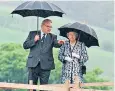  ??  ?? Robin Birley with the Queen at the fort of Vindolanda near Hadrian’s Wall in 1998