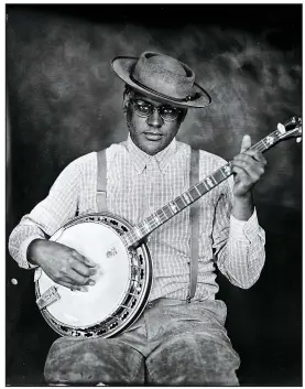  ??  ?? Courtesy Photo
Dom Flemons, one of the founders of the Carolina Chocolate Drops, recently released an album titled “Black Cowboys.” It looks, he says, at a unique time when “the country was changing, and the movement out west was extremely multiethni­c...