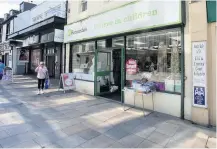  ??  ?? LUXURY The Barnardo’s store in Irvine features designer dresses