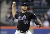  ?? ADAM HUNGER — THE ASSOCIATED PRESS ?? Mets pitcher Tylor Megill throws during the first inning against the Phillies on Friday in New York.