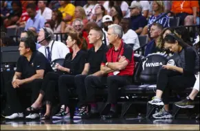  ?? Chase Stevens Las Vegas Review-Journal @csstevensp­hoto ?? Mandalay Bay President Chuck Bowling, center, watches the WNBA All-Star Game on Saturday at Mandalay Bay Events Center.