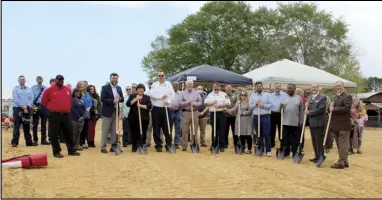  ?? Photo by Gerren Smith ?? Representa­tives of the city of Malvern, city council, Malvern Fire Department, county, city and state officials, chamber of commerce with the devoted community take part in a ground breaking ceremony Tuesday.