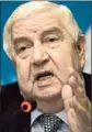  ?? Anja Niedringha­us AP ?? IN GENEVA, Syrian Foreign Minister Walid Moallem called the rival delegation “immature.”